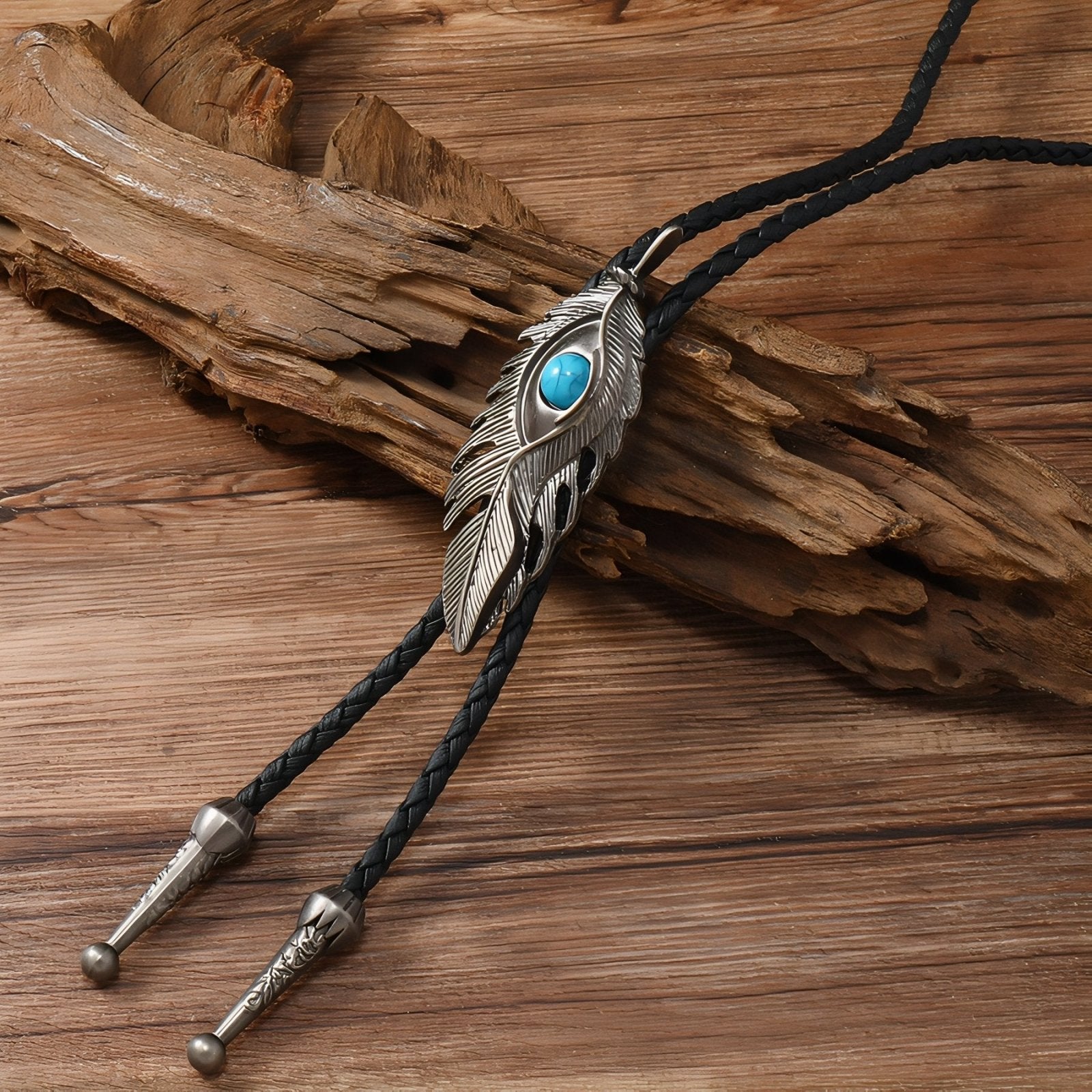 Collier bolo tie unisexe, plume avec pierre turquoise et cordon cuir noir, style amérindien vintage