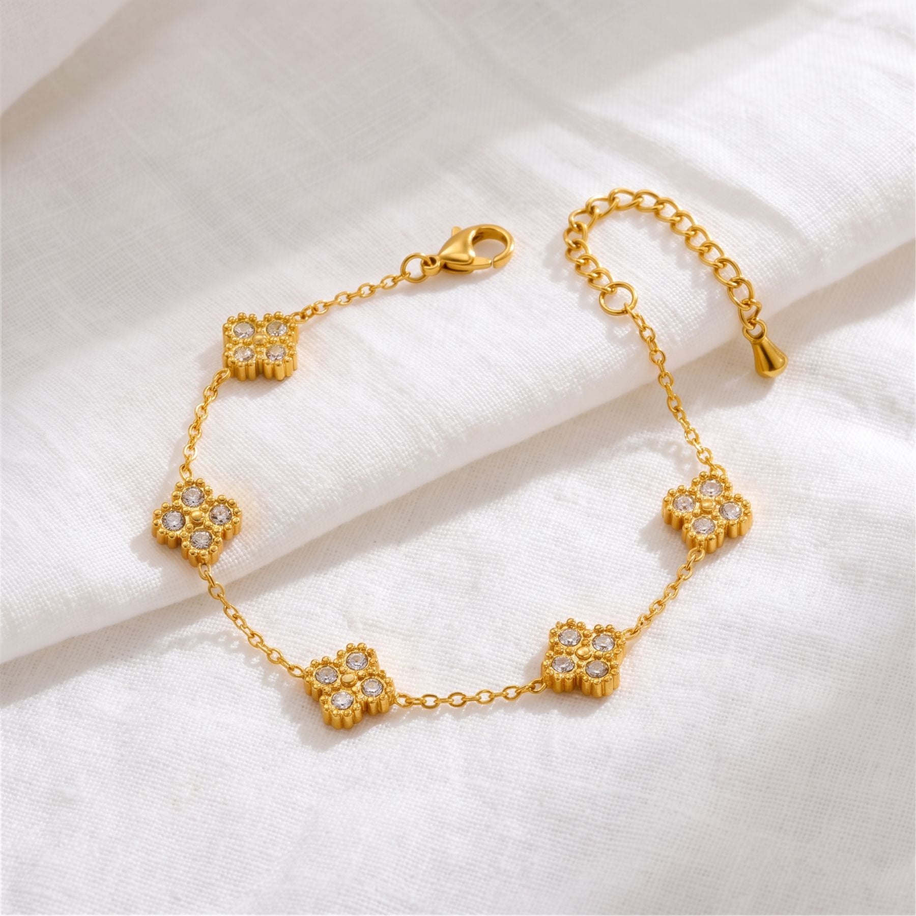 Parure de bijoux trèfle pour femme, collier, bracelet et boucles d'oreilles en acier inoxydable doré, sertis de strass