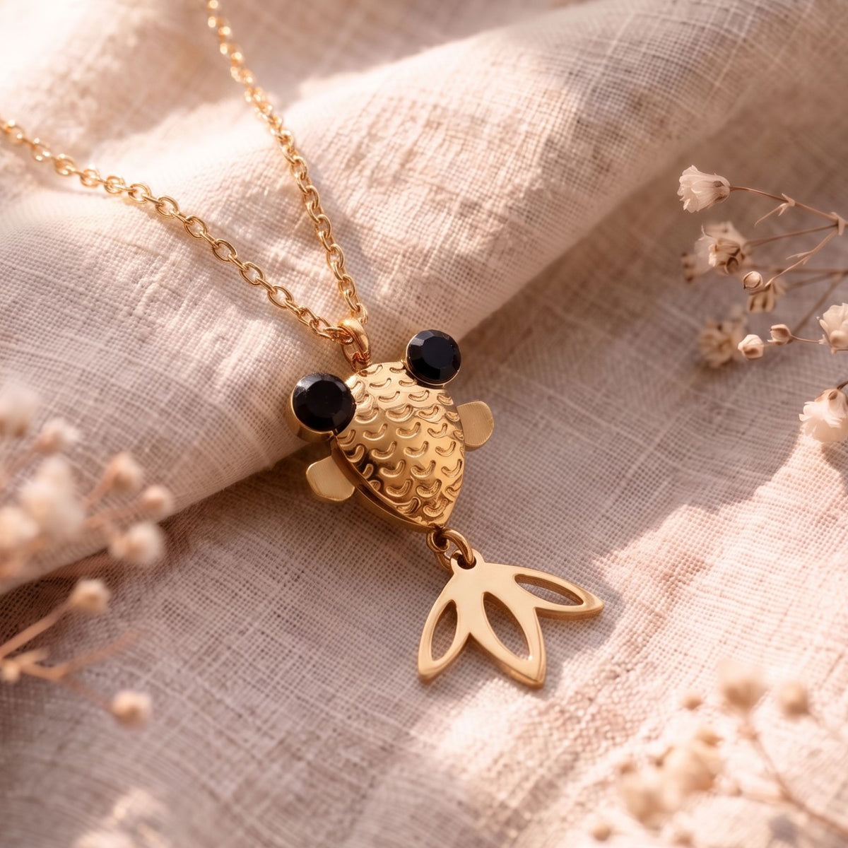 Koi fish necklace for women, in gold stainless steel, articulated pendant with sparkling black details