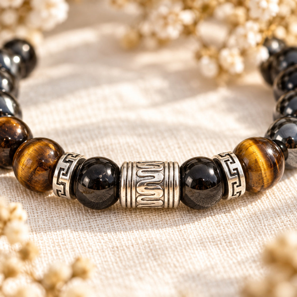 Aégorys armband van tijgeroog, hematiet en obsidiaan, symbool van bescherming