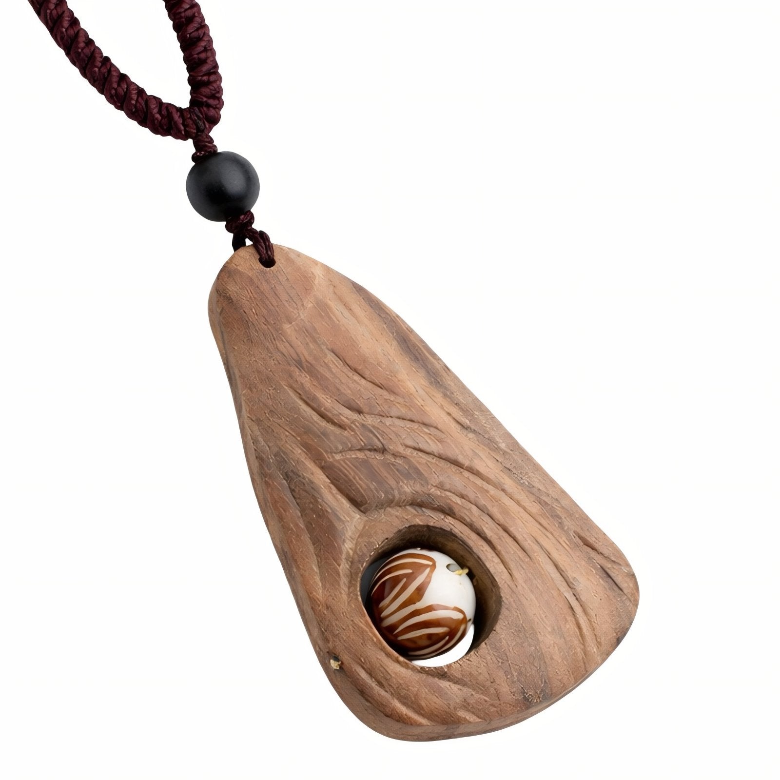 Collier artisanal en bois naturel sculpté, avec pendentif fait main et perle incrustée, style bohème