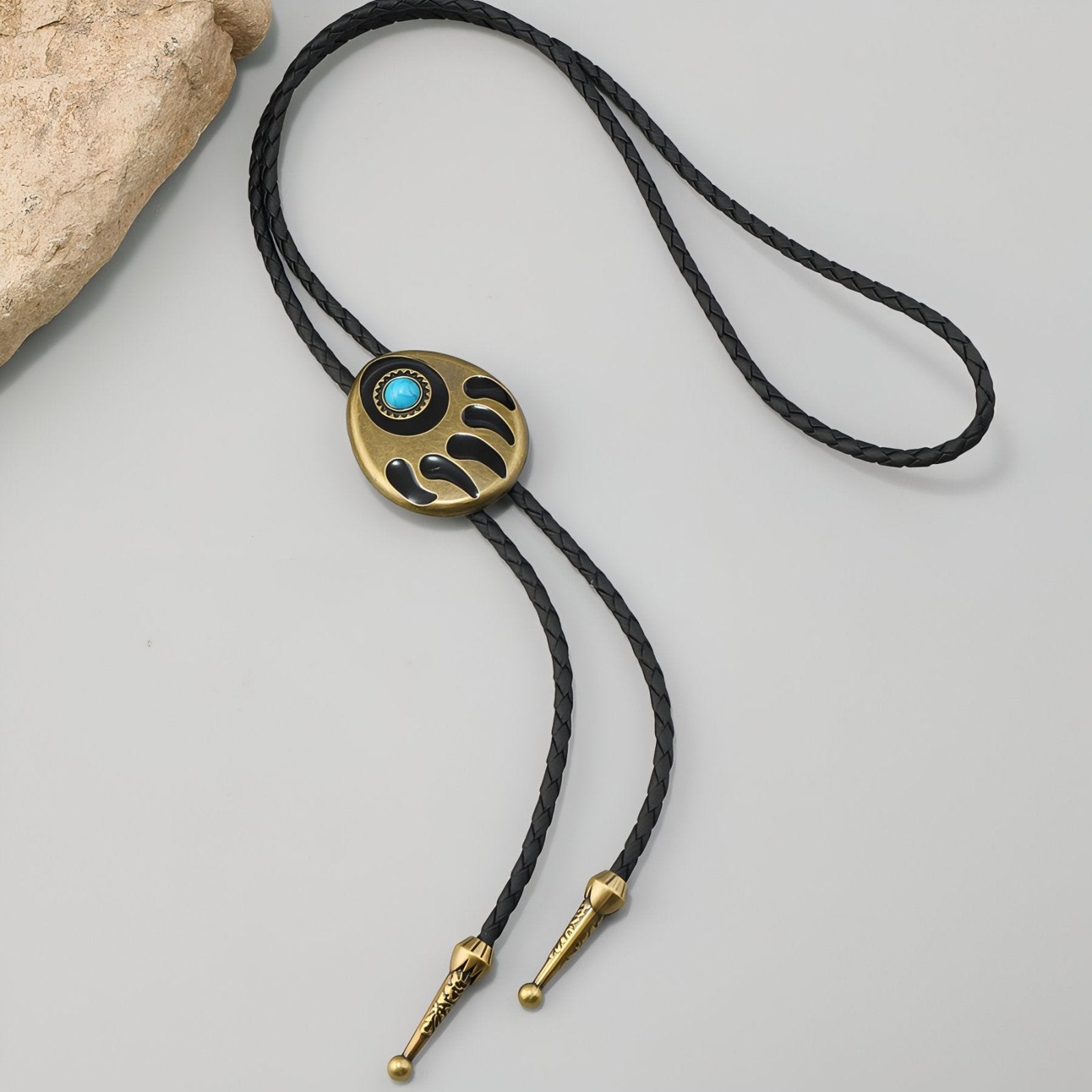 Collier bolo tie cowboy mixte, motif patte d'ours, style western, cordon en cuir noir et pierre turquoise