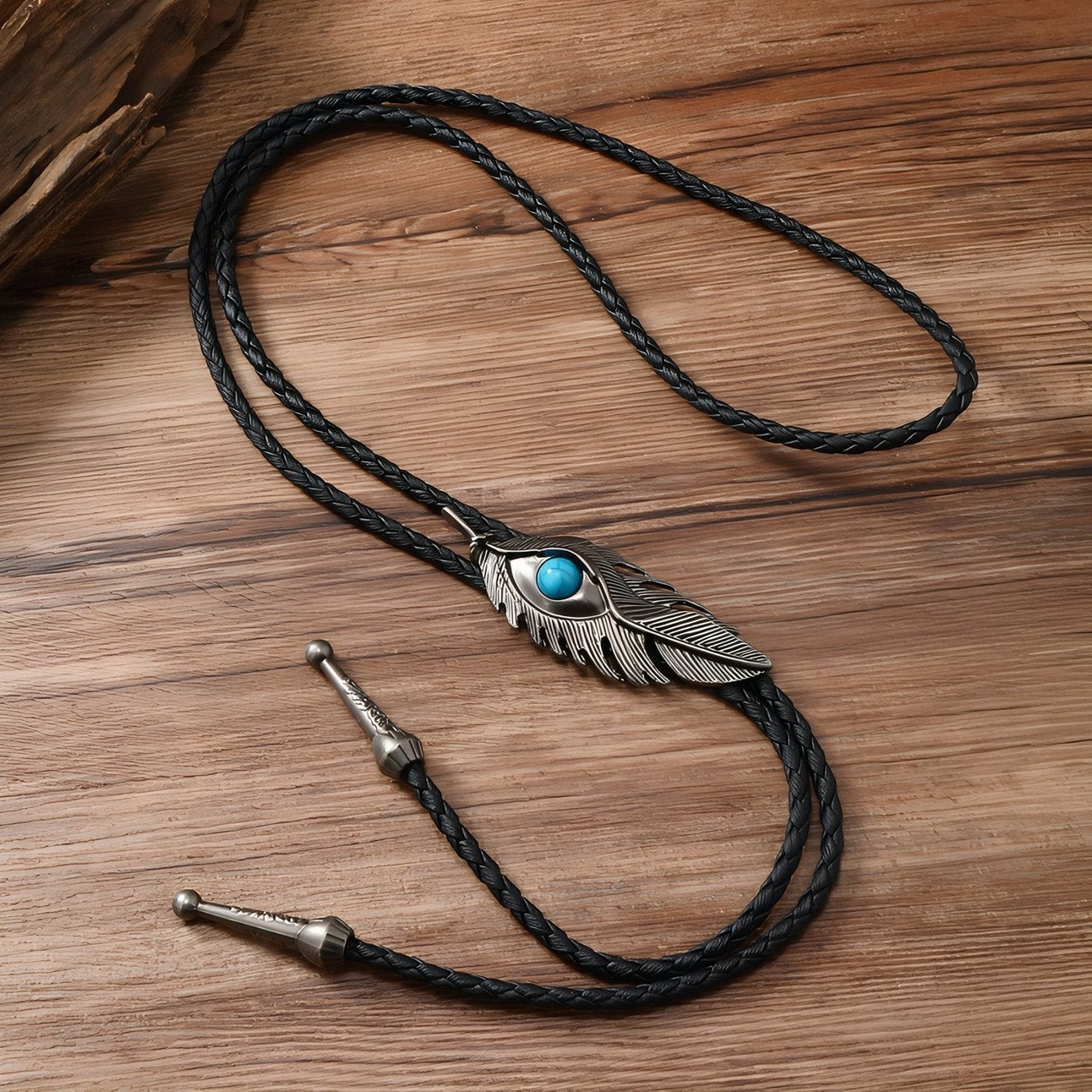 Collier bolo tie unisexe, plume avec pierre turquoise et cordon cuir noir, style amérindien vintage