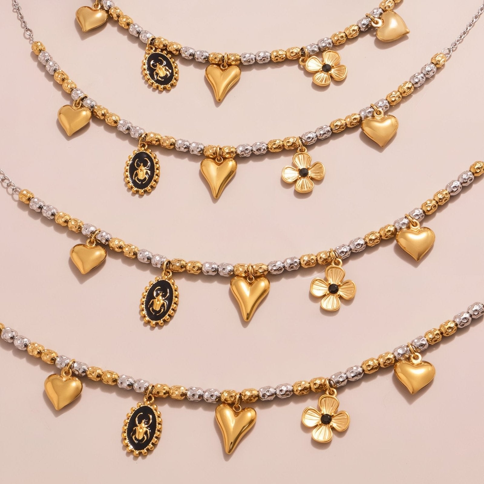 Collier charms or et argent, pendentifs cœurs, fleur et scarabée, en acier inoxydable