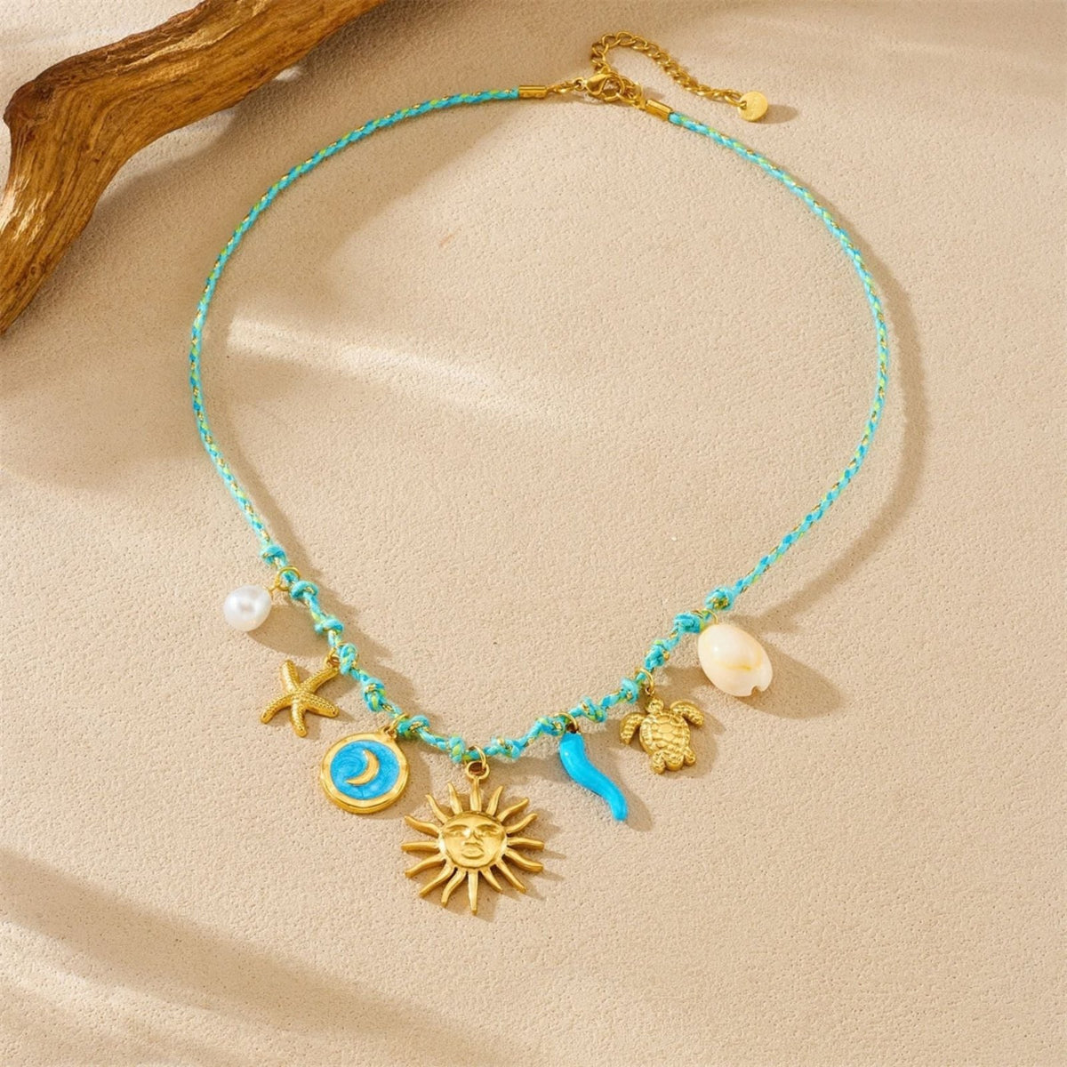Collier charms soleil pour femme, en acier inoxydable doré, cordon tressé avec tortue et étoile de mer