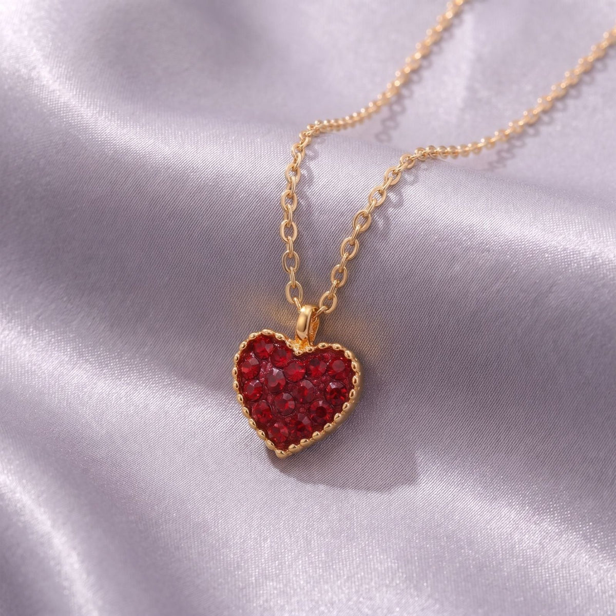 Collier cœur pour femme, en acier inoxydable doré, avec pendentif pavé de pierres scintillantes
