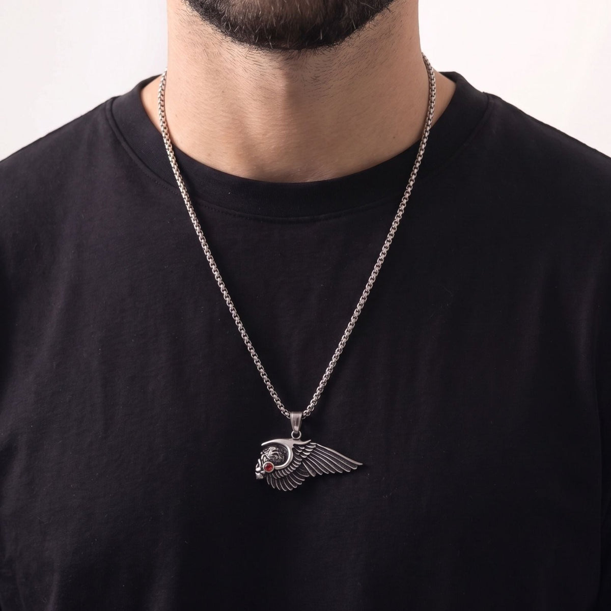 Collier crâne ailé pour homme, en acier titane, pendentif tête de mort avec aile et pierre rouge sertie