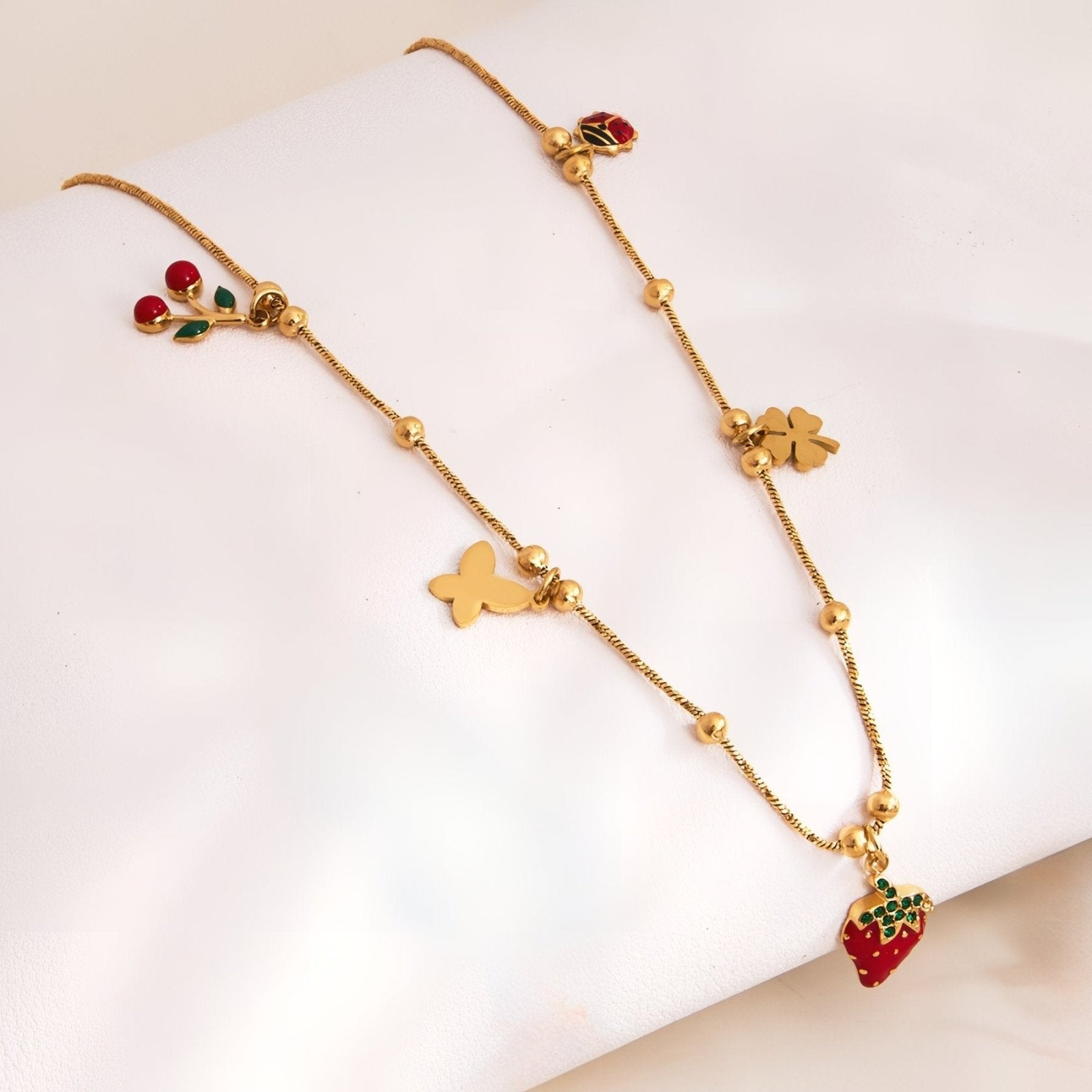 Collier doré femme, breloques fraise, coccinelle et cerises, acier inoxydable plaqué or 18K