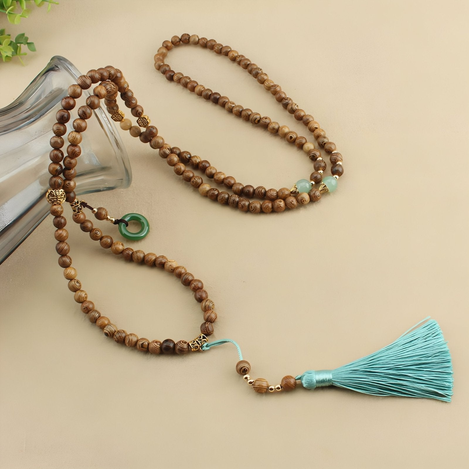 Collier en perles de bois naturel avec pompon, ornements en alliage métallique, style bohème