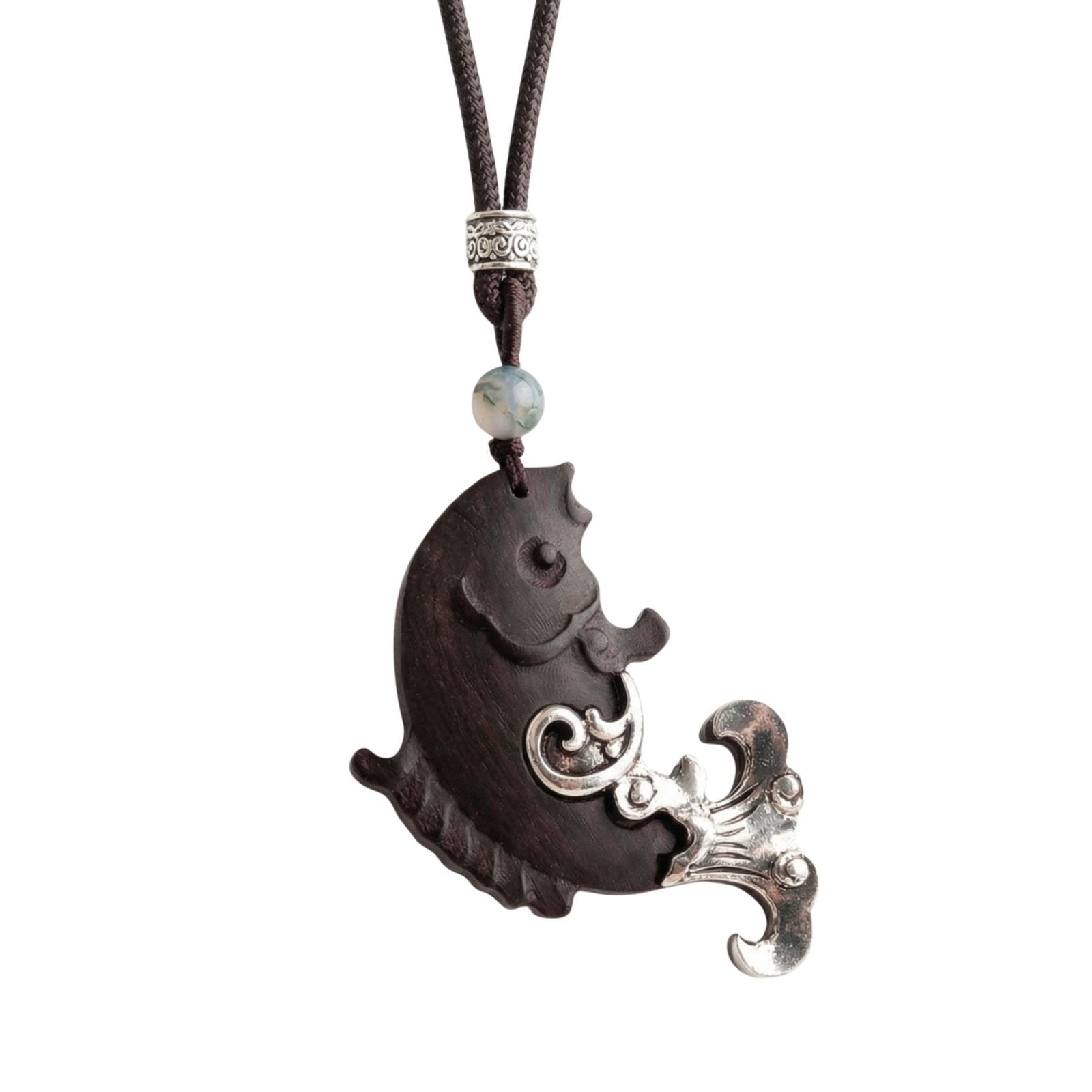 Collier ethnique en bois d’ébène noir sculpté, avec pendentif symbolique, alliage métallique et cordon