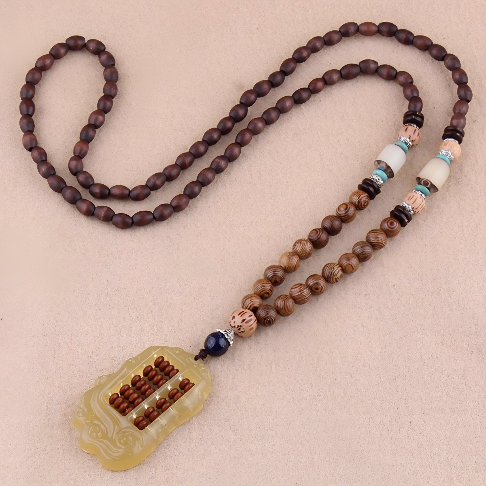 Collier mixte en perles de bois, avec pendentif abaque en résine, style artisanale