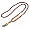 Collier mixte en perles de bois, avec pendentif corne et alliage métallique, style bohème