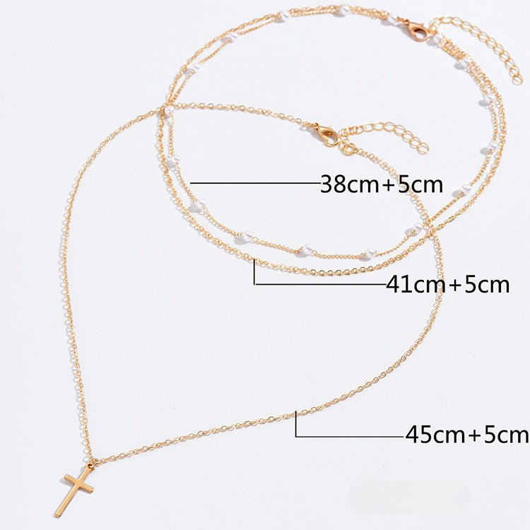 Collier multi - rangs avec pendentif croix et perles blanches, modèle Kovalenko