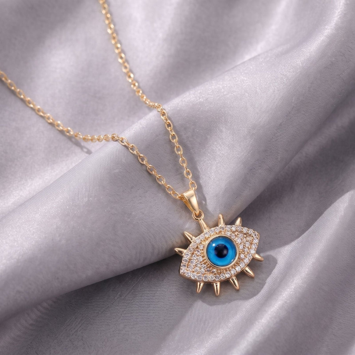 Collier œil bleu protecteur pour femme, en acier titane doré, pendentif mauvais œil