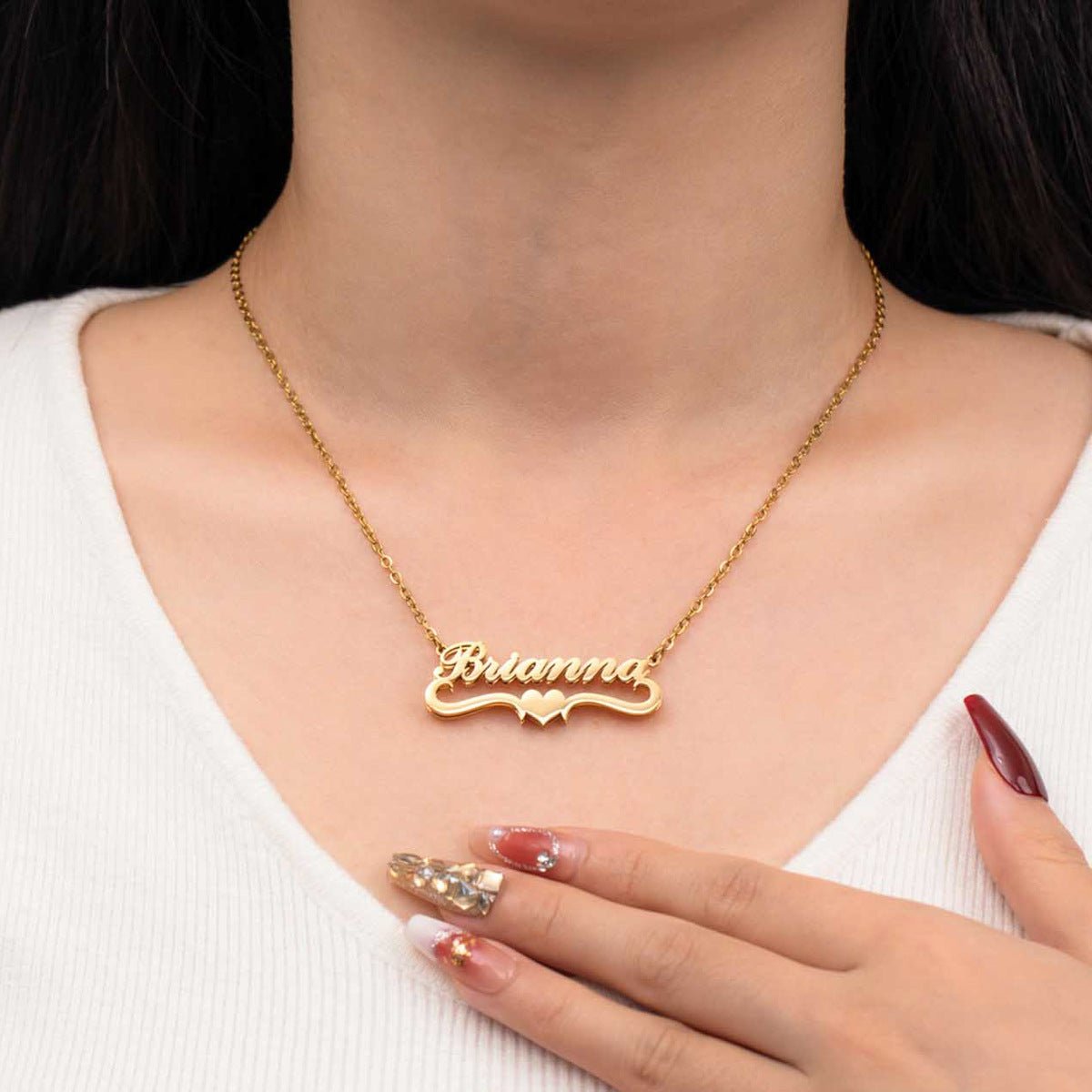 Collier prénom chic avec ornement double vague et cœur, doré ou argenté, modèle Valentina