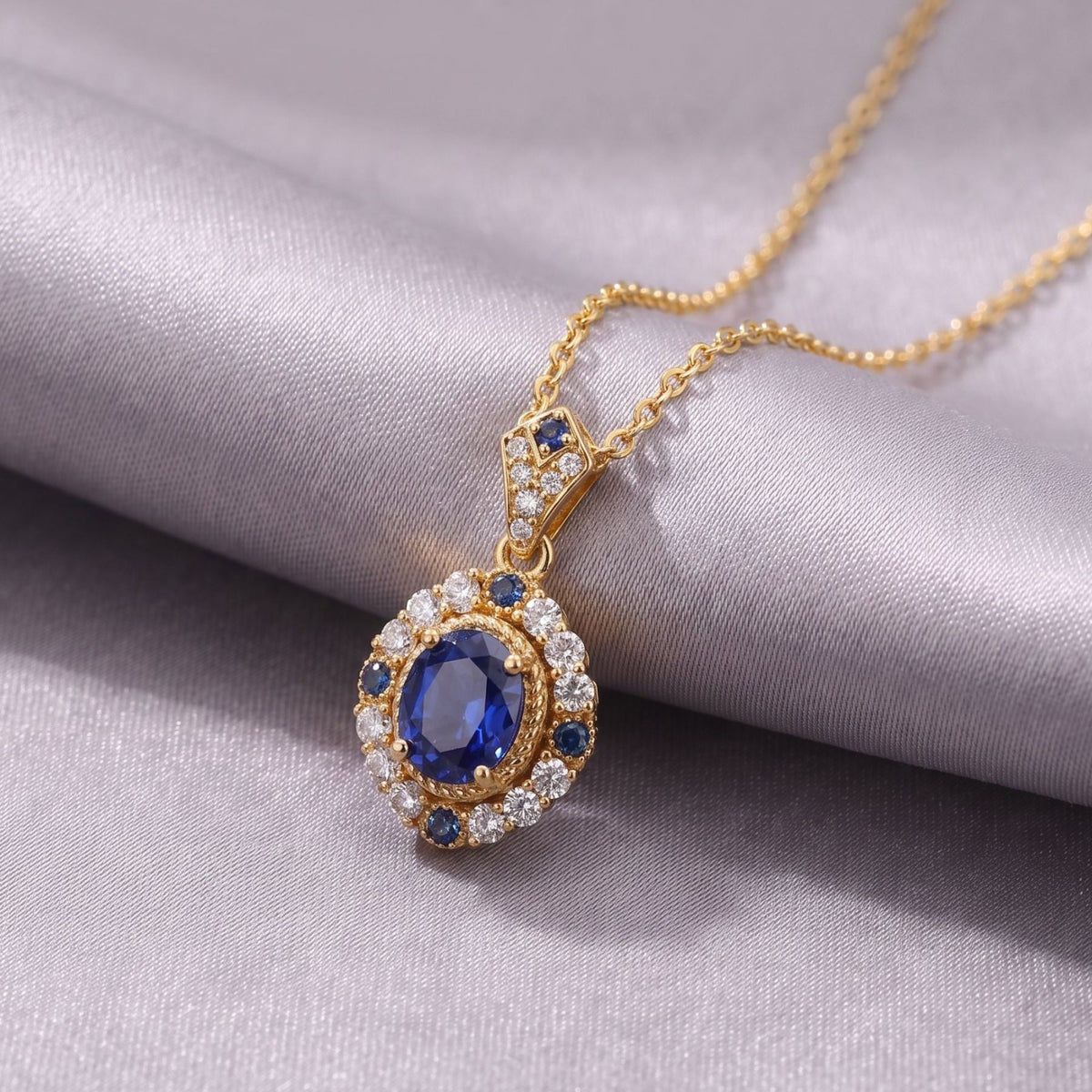Collier saphir bleu pour femme, en cuivre doré, pendentif ovale entouré de zircons scintillants